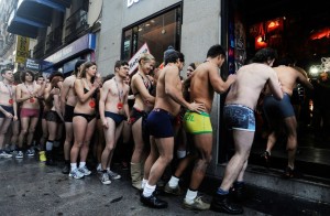 Semi-Nude Shoppers Queue For Free Clothes In Madrid Sales