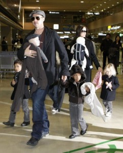 U.S. actors Pitt and Jolie arrive with their children at Narita airport