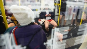 People take part in the No Pants Subway Ride in Berlin